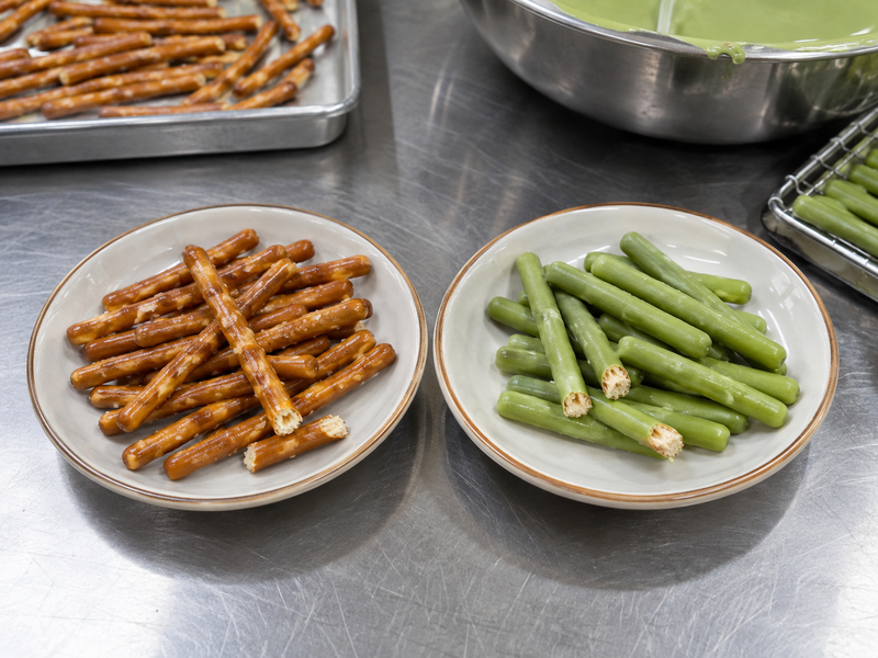 Coated and uncoated pretzel samples arranged for crunch and coating comparison