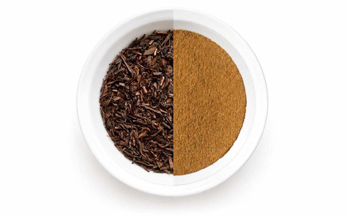 Hojicha tea leaves and powder on a white plate