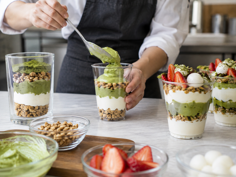 A measured parfait layer diagram sits beside saleable clear cups
