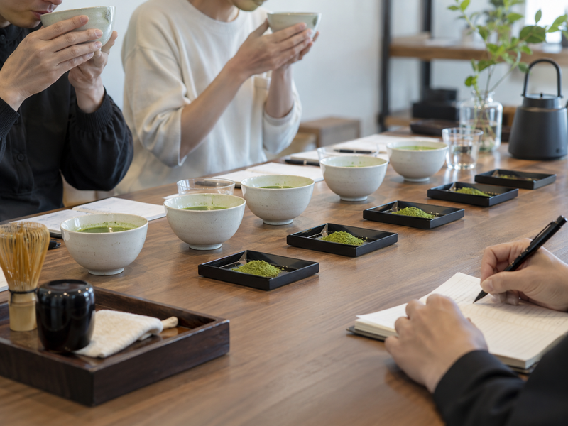 A manager costs a complete matcha flight with cups and tasting card