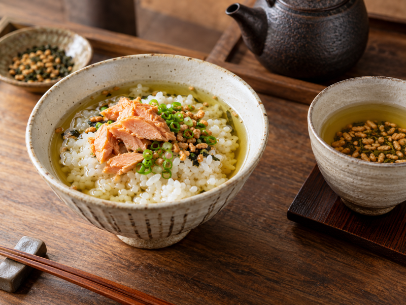 Bowl of genmaicha ochazuke with salmon in a restaurant test kitchen