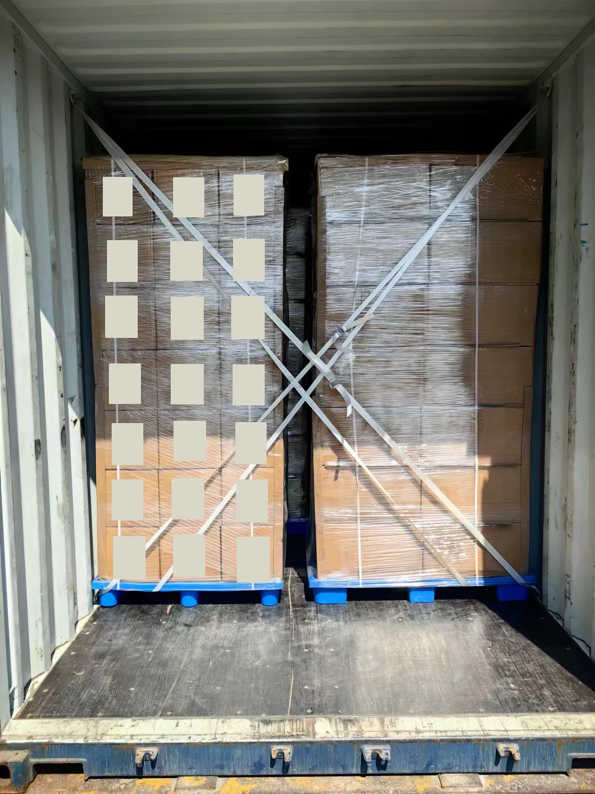 Matcha cartons loaded for shipment, with identifying labels redacted