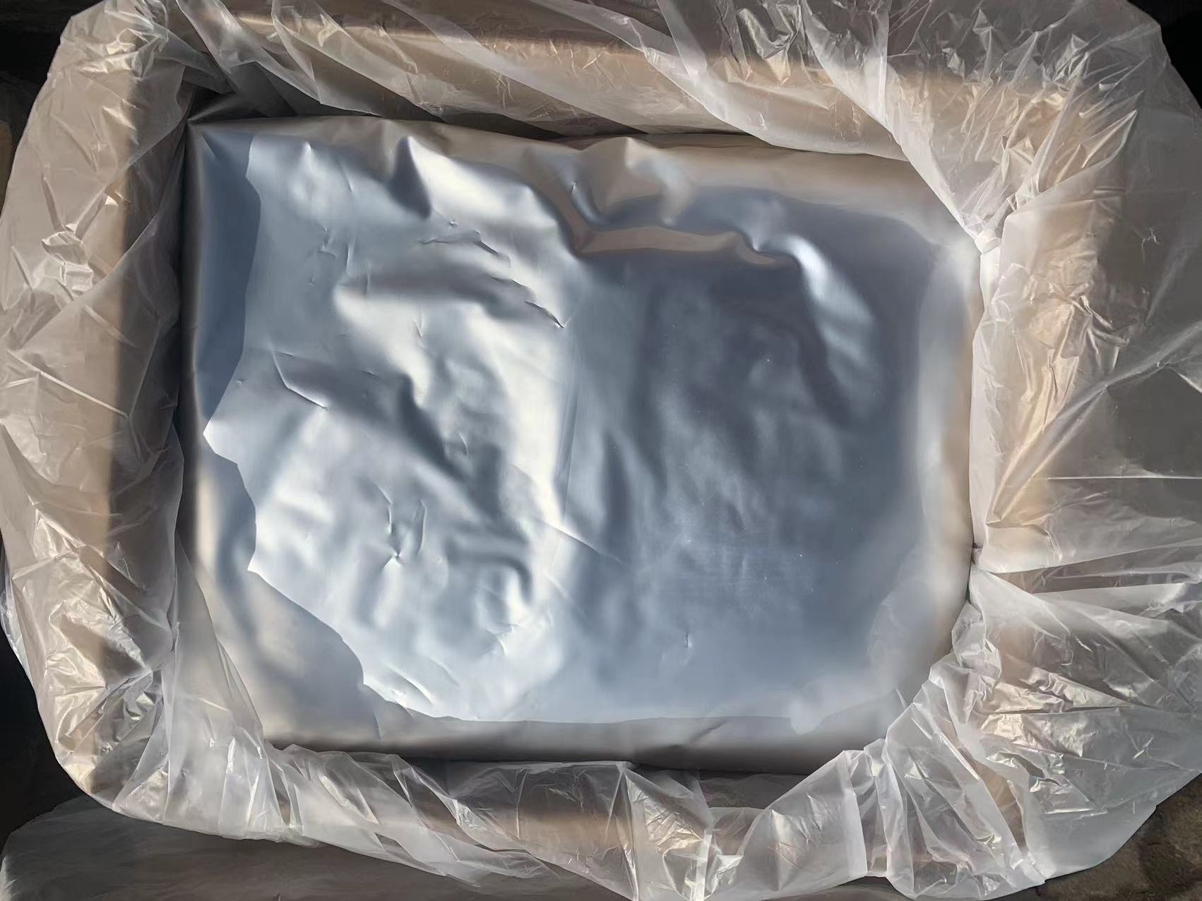 Sealed foil protective bag inside a lined shipping carton