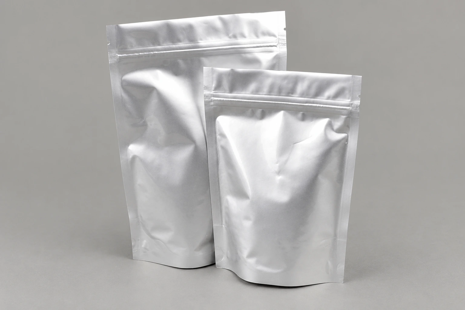 Two silver resealable stand-up pouches